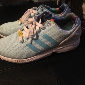 Women’s Adidas  Torsion running shoes